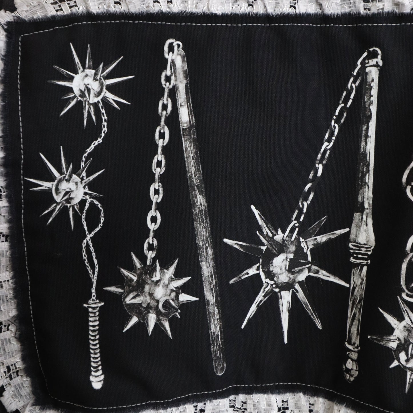Decorative weapon patch crop top